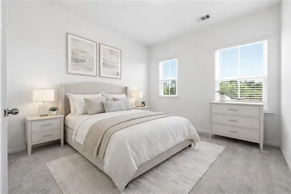 a bedroom with a bed and a closet
