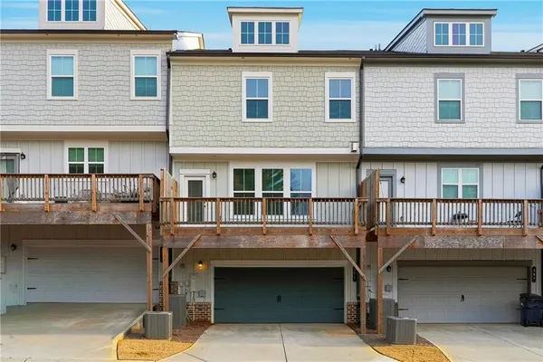 a front view of a building with balcony