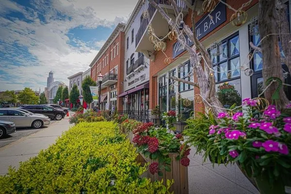 a view of a street with cars