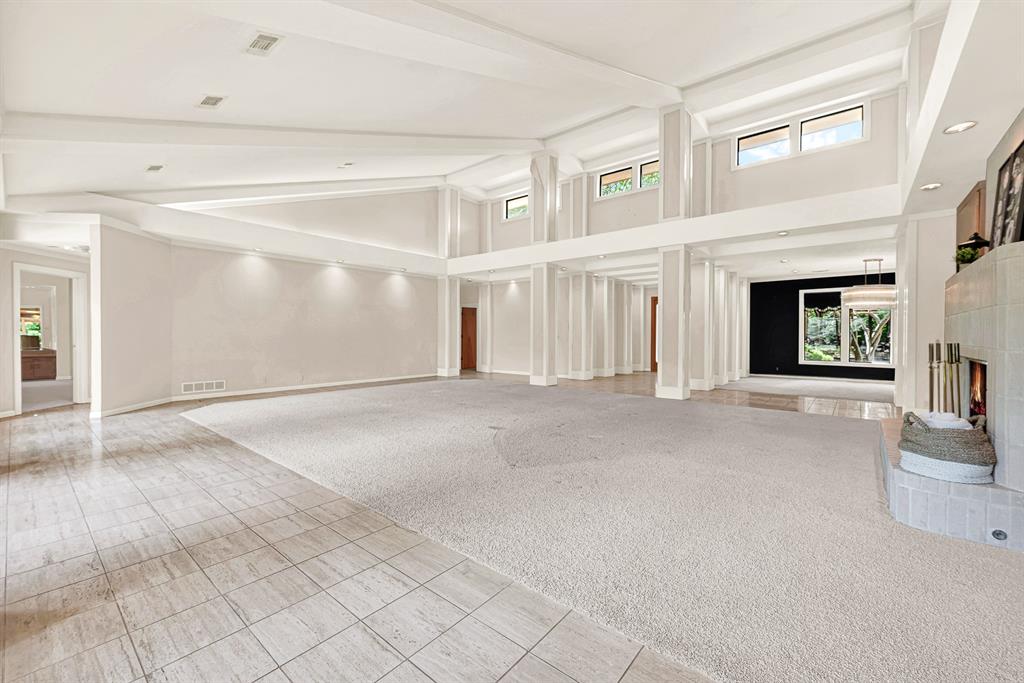 933 Mobley Road Cedar Hill, TX 75104 - Photo 14 of 40 Architectural interests with vaulted ceilings and specialty lighting make this room ready for entertaining - stunning at nighttime.