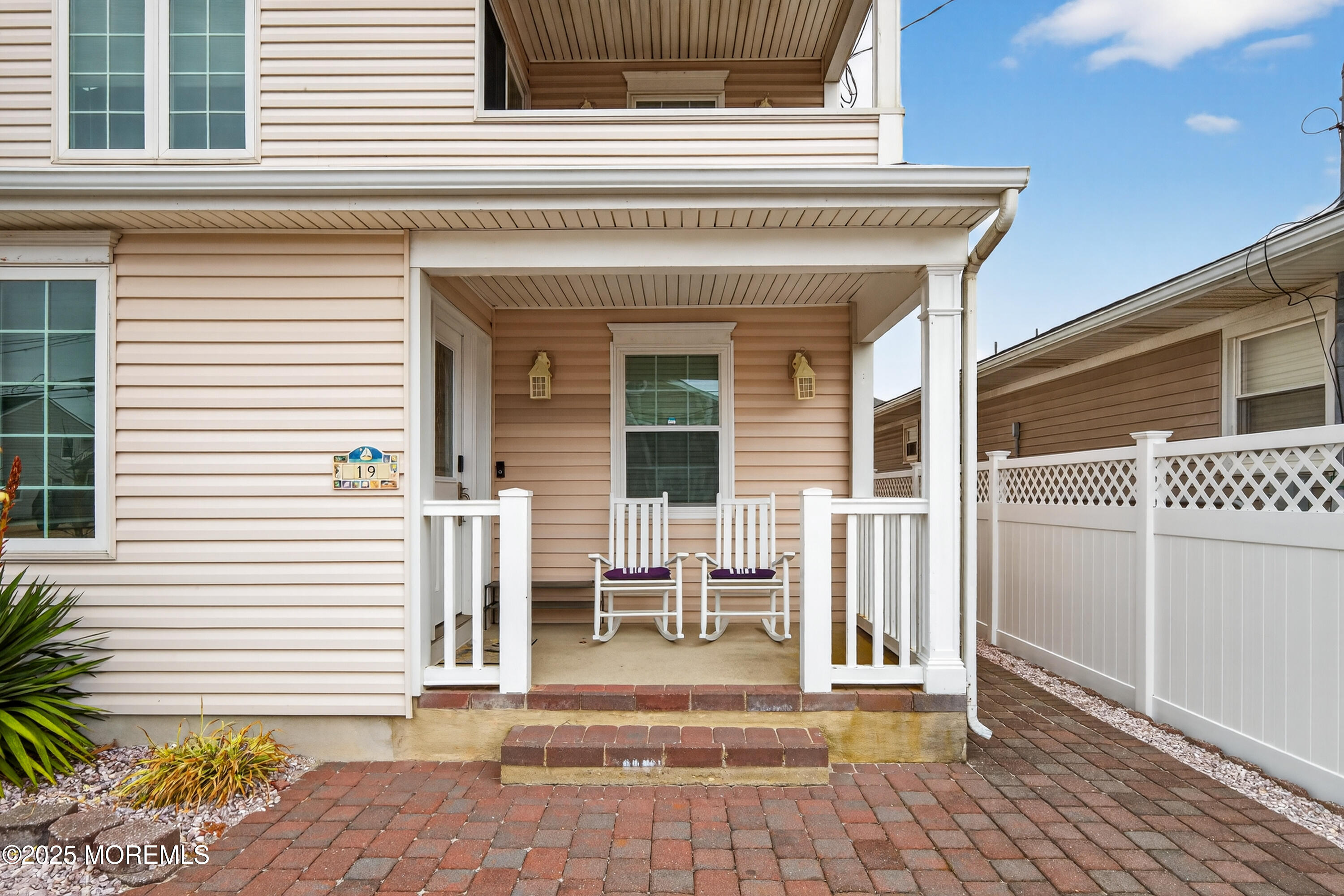 A19 Haddonfield Avenue Lavallette, NJ 08735 - Photo 3 of 24 a view of a house with a door and a chair