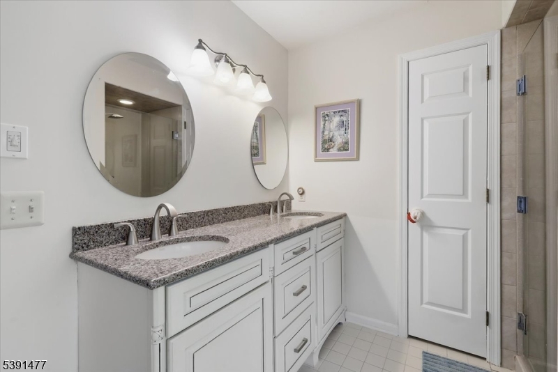 42 Copper Penny Road Flemington, NJ 08822 - Photo 26 of 39 a bathroom with a double vanity sink and a mirror