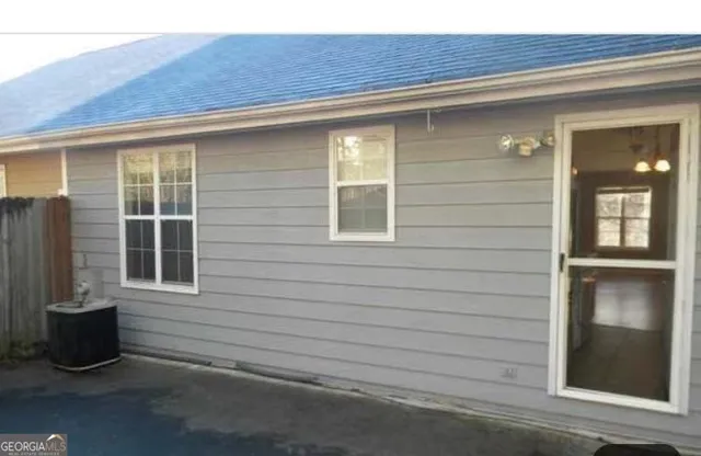 a front view of a house with a window