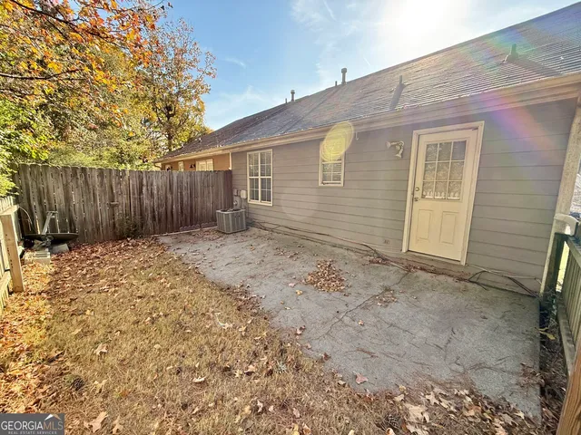 a view of a backyard of the house