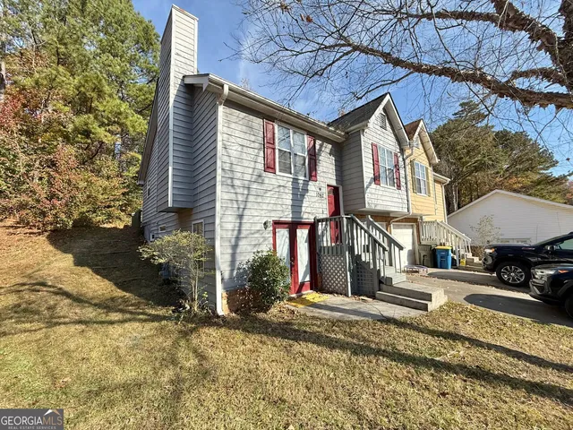 a view of a houses on the street