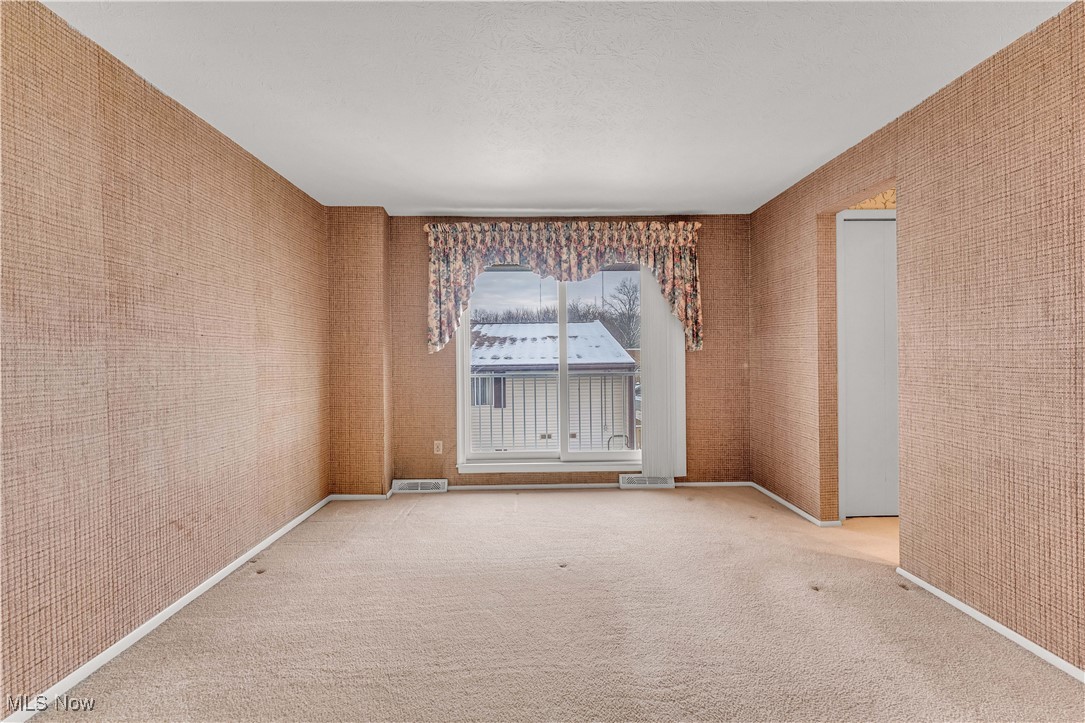 6470 State Road, Unit K5 Parma, OH 44134 - Photo 14 of 26 Unfurnished room with carpet floors and wallpapered walls