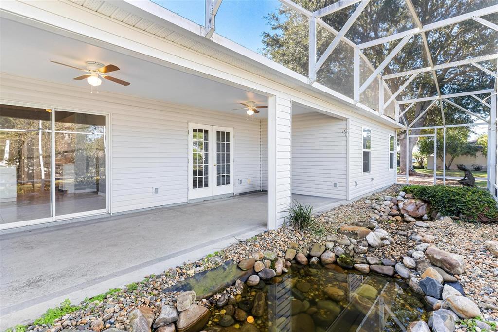 1009 Forest Breeze Path Leesburg, FL 34748 - Photo 24 of 28 a view of a house with a yard