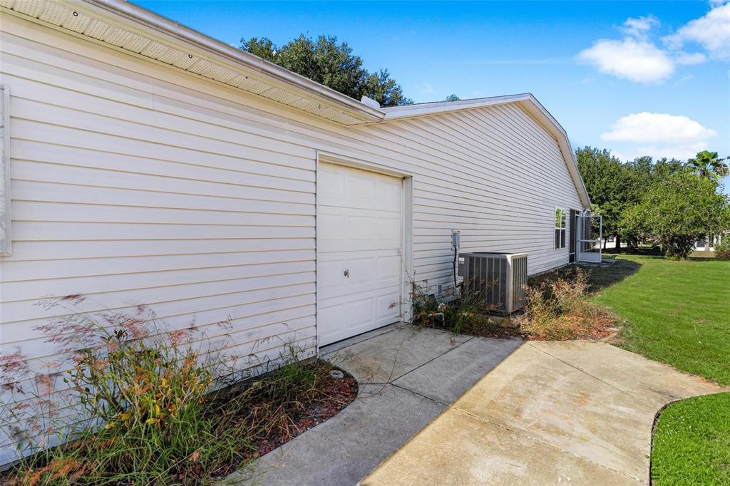 1009 Forest Breeze Path Leesburg, FL 34748 - Photo 26 of 28 a view of backyard of house and trees