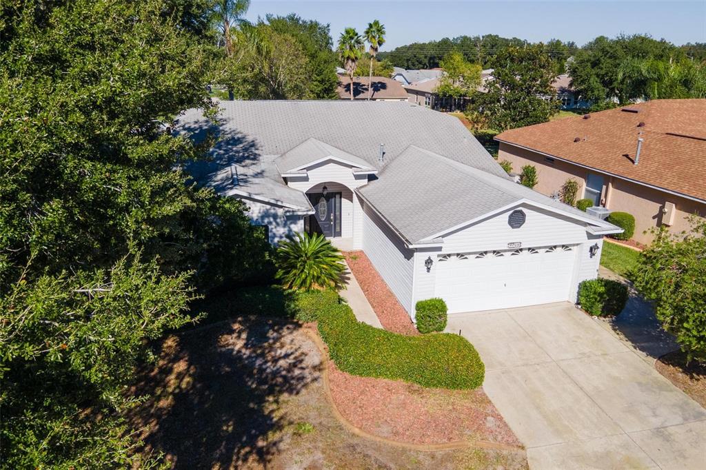 1009 Forest Breeze Path Leesburg, FL 34748 - Photo 27 of 28 an aerial view of a house