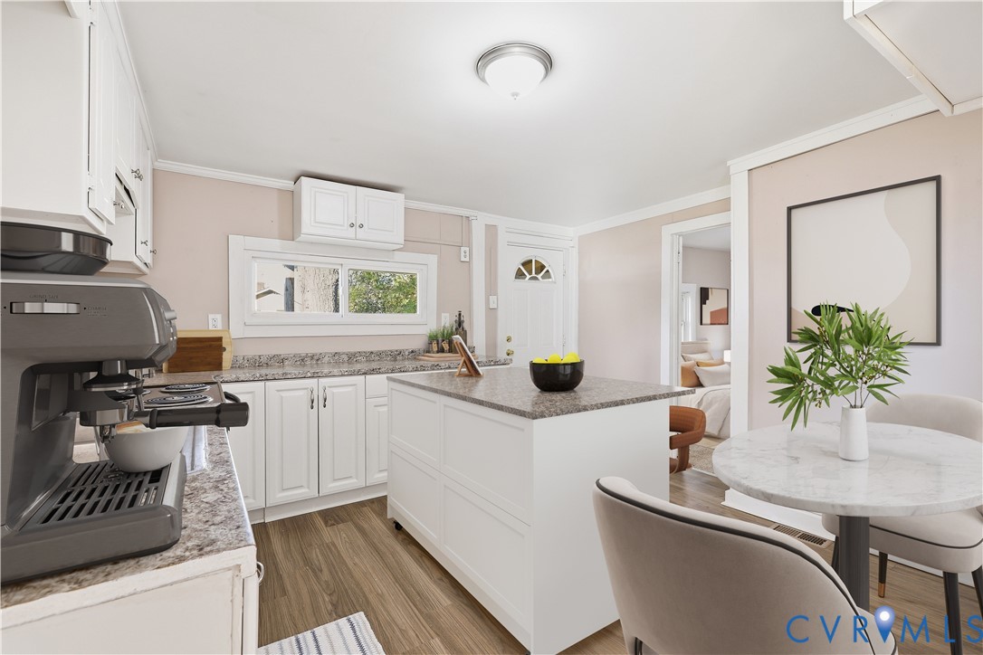 116 Fairfax Avenue Colonial Heights, VA 23834 - Photo 14 of 20 Kitchen with white cabinetry, a kitchen island, cr