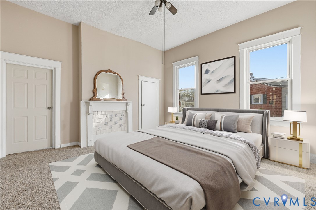 116 Fairfax Avenue Colonial Heights, VA 23834 - Photo 9 of 20 Bedroom featuring carpet, a textured ceiling, and