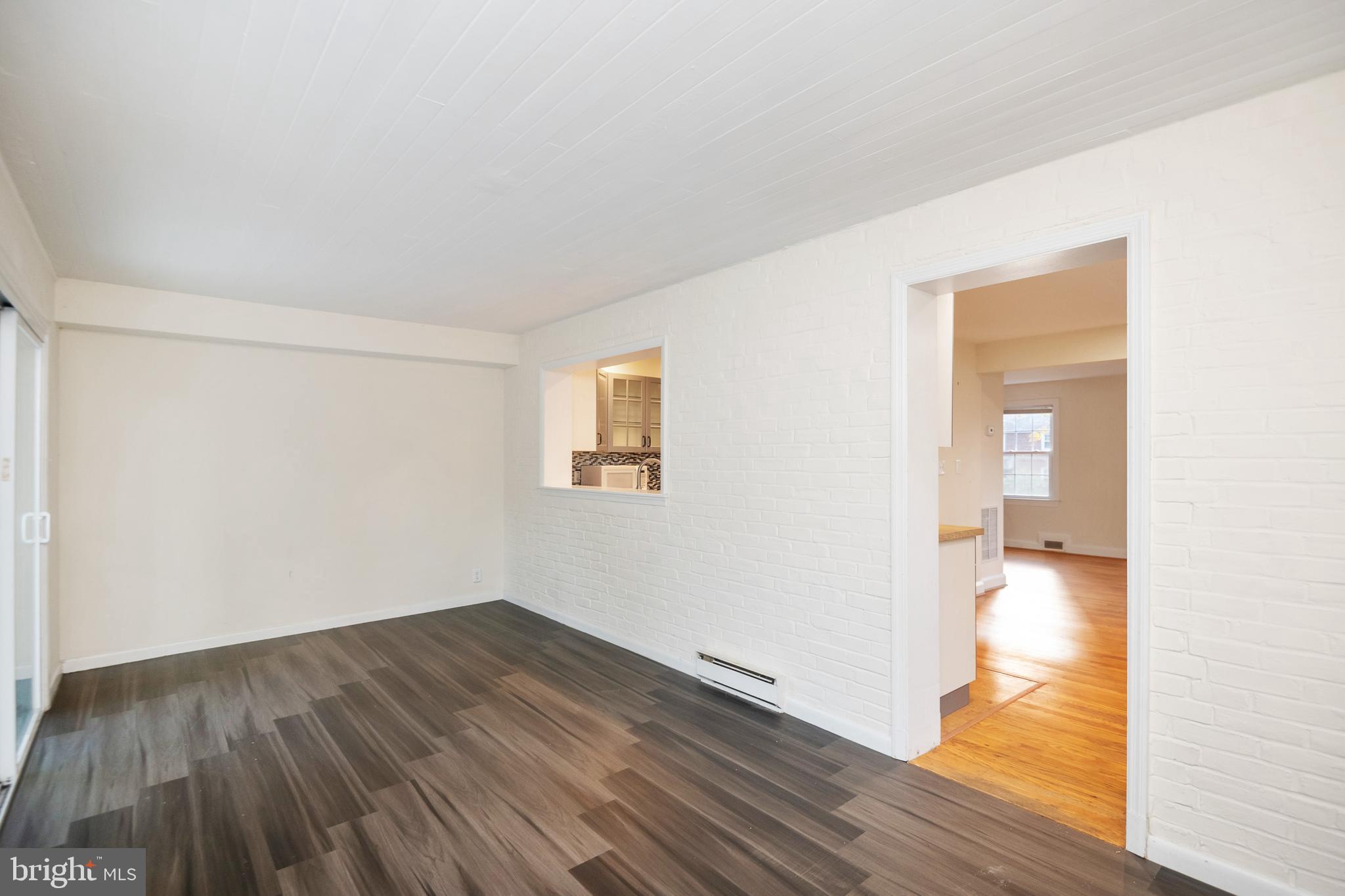 805 Olmstead Road Baltimore, MD 21208 - Photo 16 of 38 Sunroom with new LVT flooring