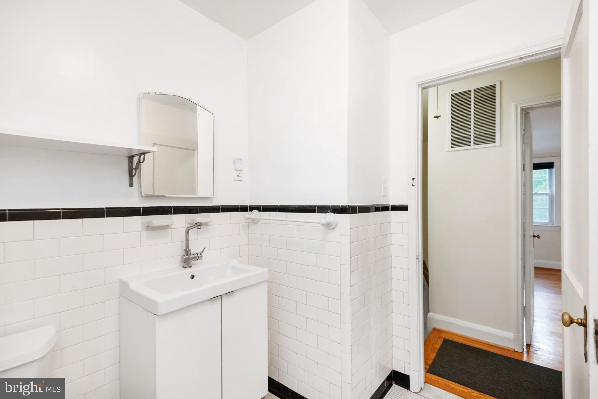 805 Olmstead Road Baltimore, MD 21208 - Photo 26 of 38 Full bathroom with new sink cabinets and fixtures