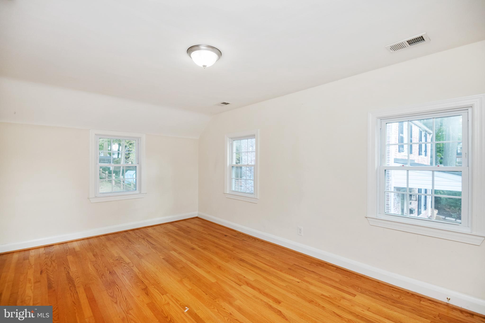 805 Olmstead Road Baltimore, MD 21208 - Photo 27 of 38 Bedroom 3 with hardwood floors