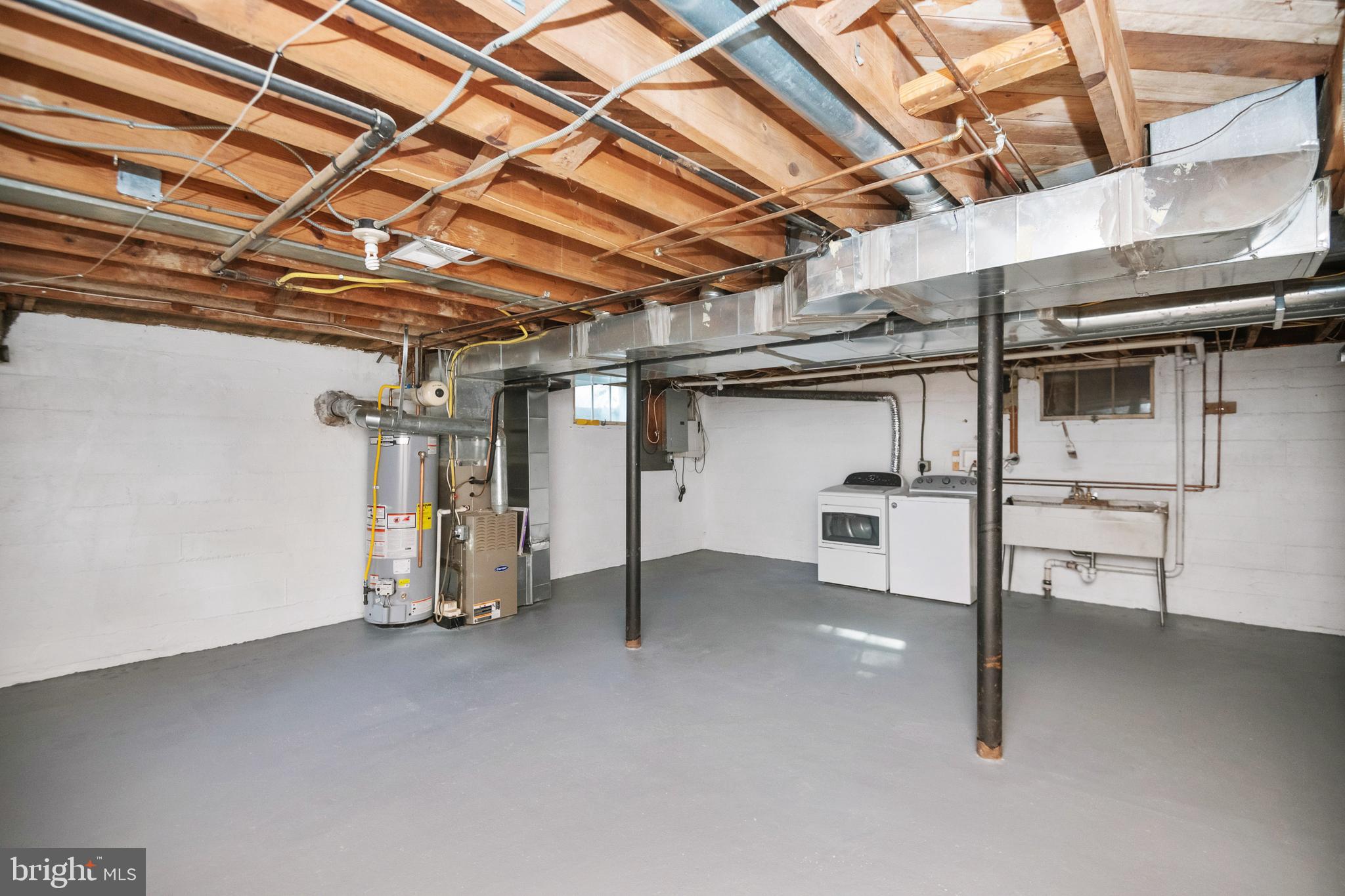 805 Olmstead Road Baltimore, MD 21208 - Photo 29 of 38 Basement freshly painted and open for finishing