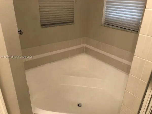a bathroom with a bathtub
