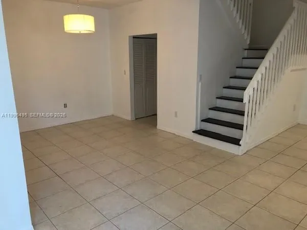 a view of entryway with stairs