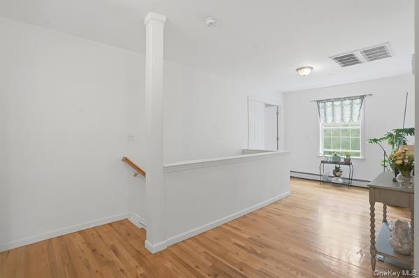 29 Hickory Hill Road Newburgh, NY 12550 - Photo 39 of 47 a view of a room with wooden floor and windows