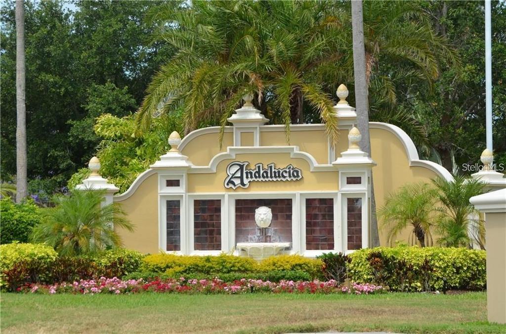 5913 La Rosa Lane Apollo Beach, FL 33572 - Photo 2 of 10 a front view of a house with garden