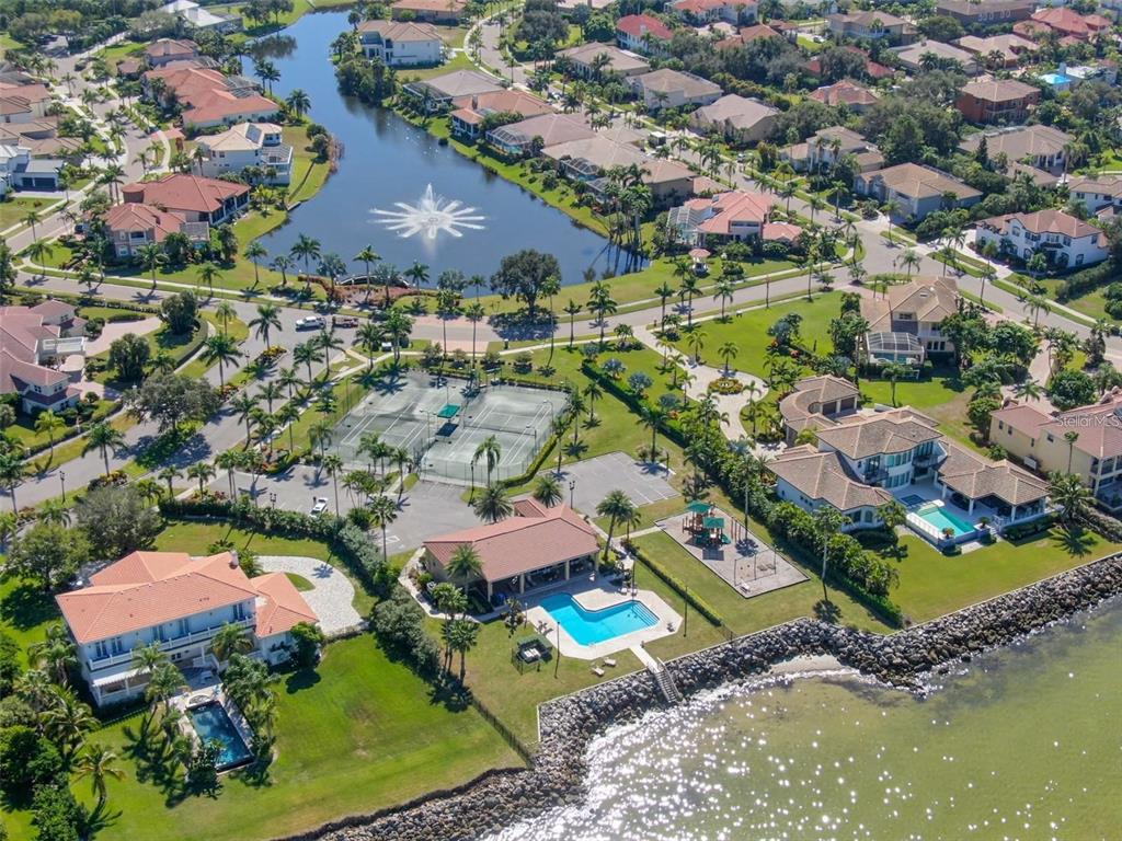 5913 La Rosa Lane Apollo Beach, FL 33572 - Photo 10 of 10 an aerial view of residential houses with outdoor space and swimming pool