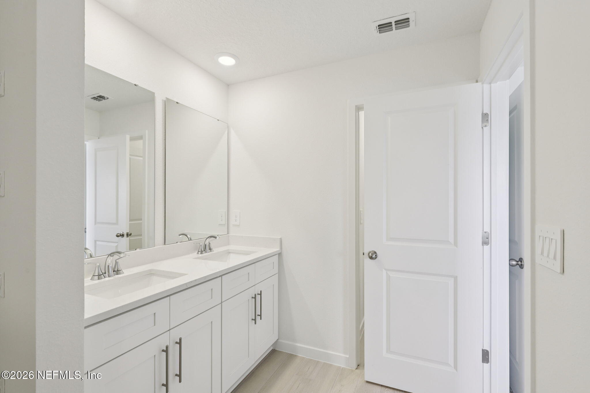 25 Rangeline Drive St. Augustine, FL 32092 - Photo 41 of 43 a bathroom with 2 sink shower and a mirror
