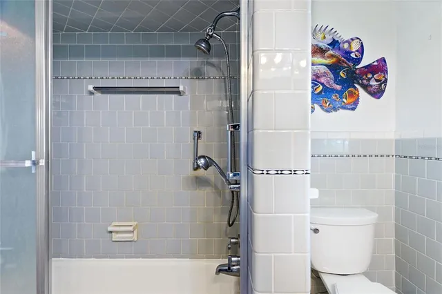 a view of a house with backyard and porch