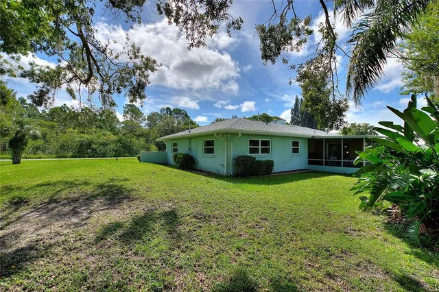 a view of a lake with a garden