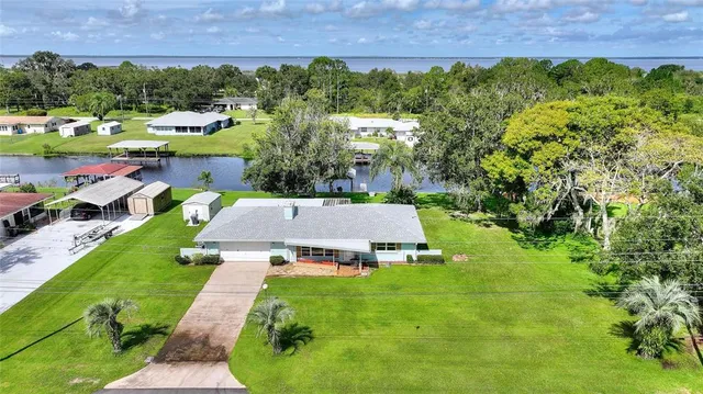 a view of a yard with an outdoor space