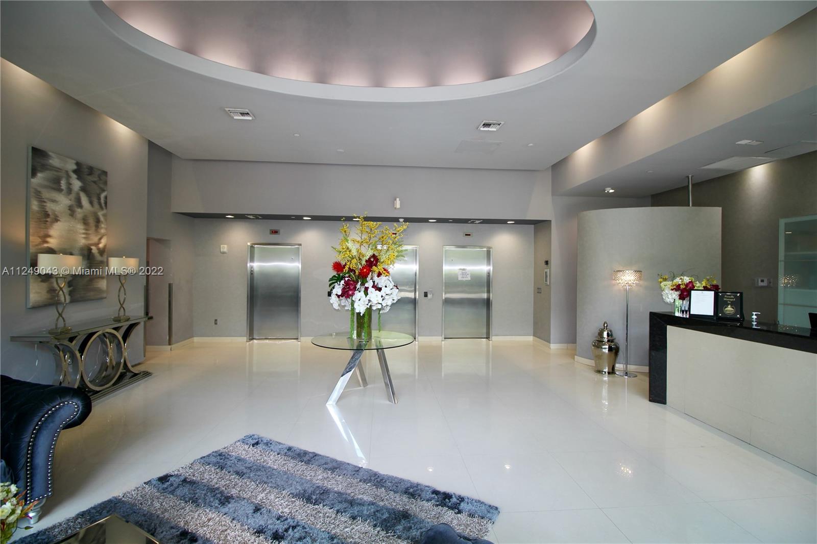 275 Northeast 18th Street, Unit 306 Miami, FL 33132 - Photo 14 of 15 a view of a living room and dining room
