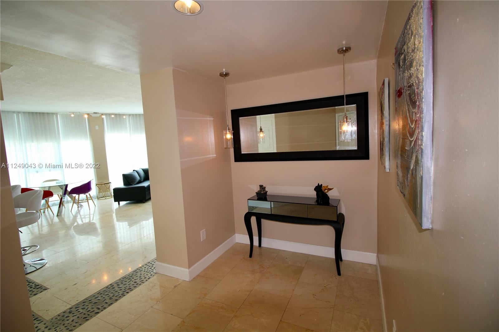 275 Northeast 18th Street, Unit 306 Miami, FL 33132 - Photo 2 of 15 a view of a living room and dining room