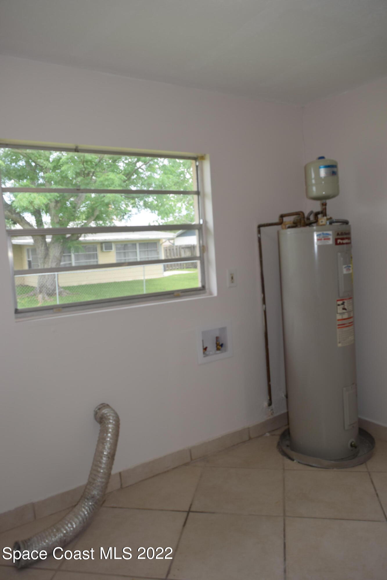 771 Cobblestone Lane Northeast Palm Bay, FL 32905 - Photo 12 of 30 a view of a bathroom with a sink