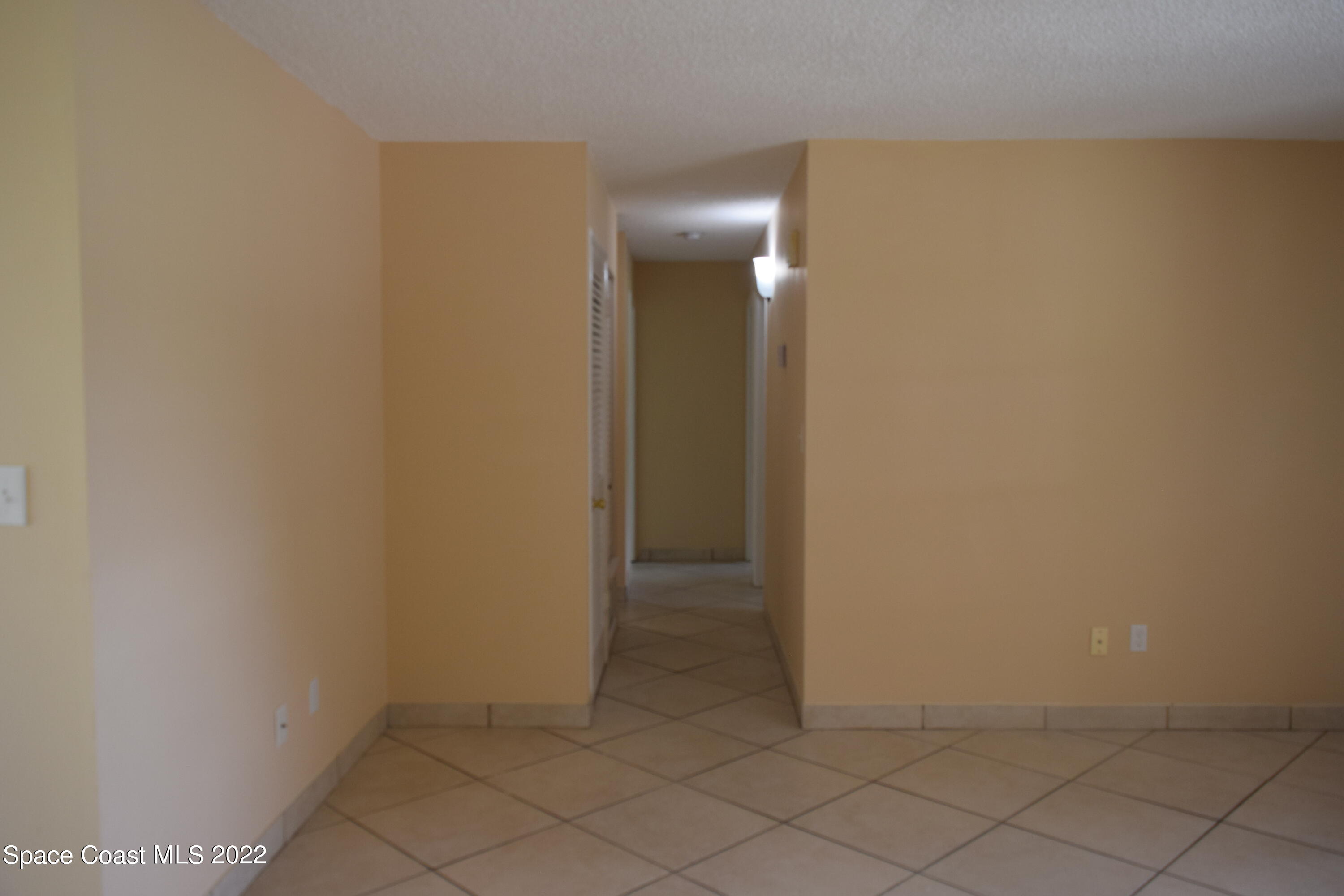 771 Cobblestone Lane Northeast Palm Bay, FL 32905 - Photo 15 of 30 a view of an empty room