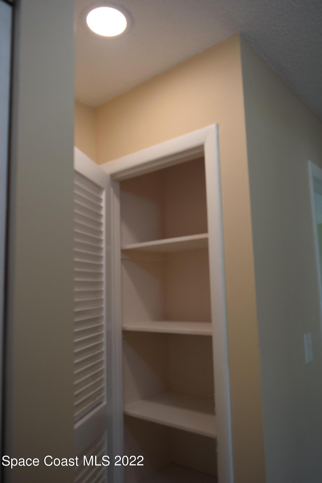 771 Cobblestone Lane Northeast Palm Bay, FL 32905 - Photo 18 of 30 a close view of closet