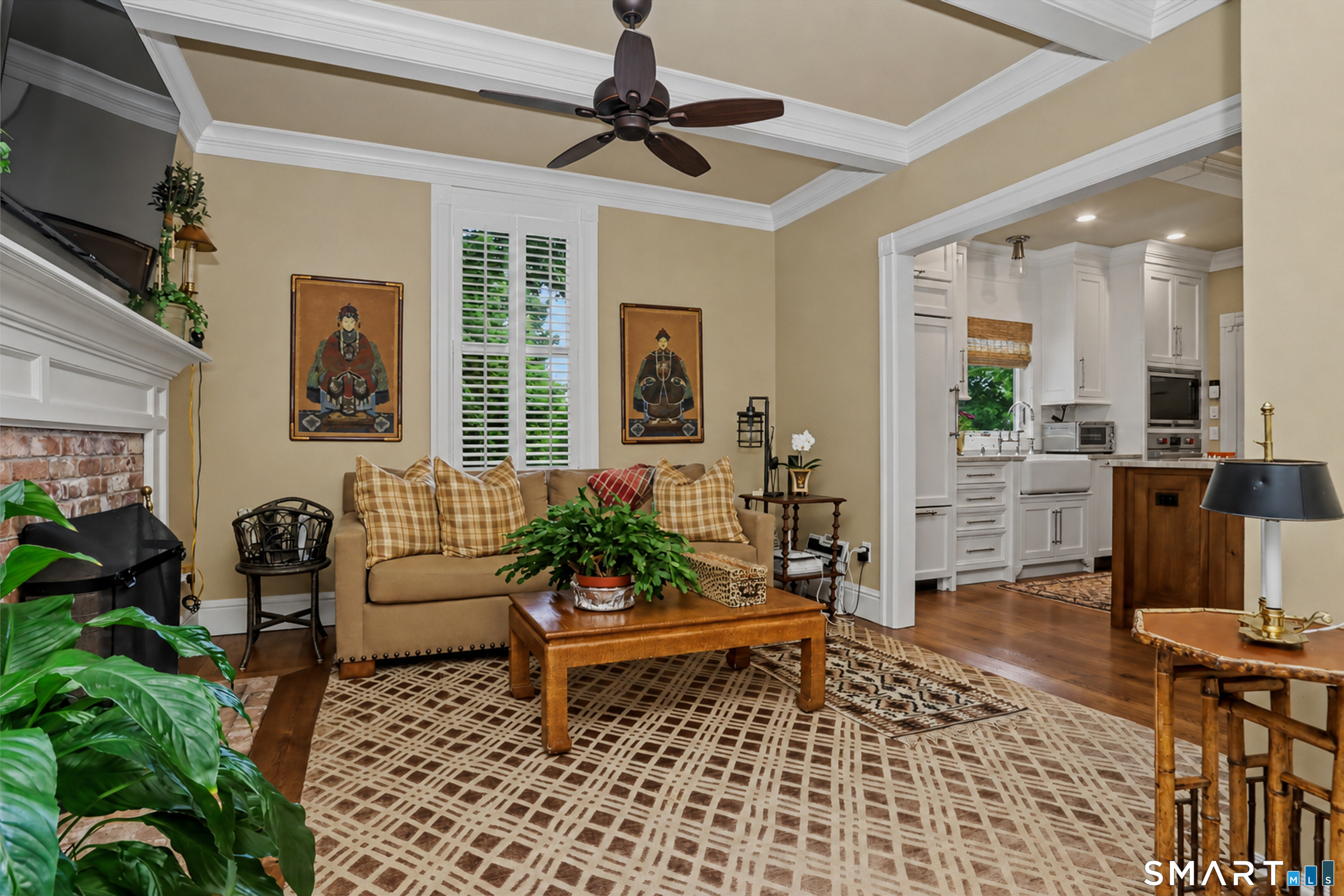 36 Catoonah Street, Unit 18 Ridgefield, CT 06877 - Photo 17 of 40 a living room with furniture and wooden floor