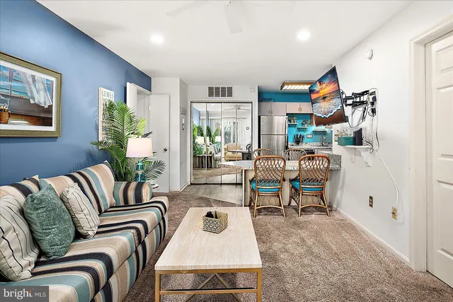 a living room with furniture and a table