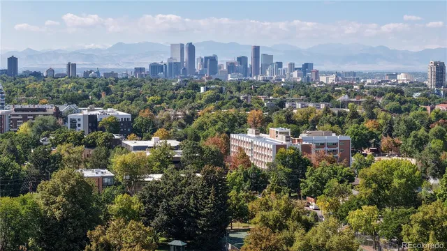 a view of a city with tall buildings