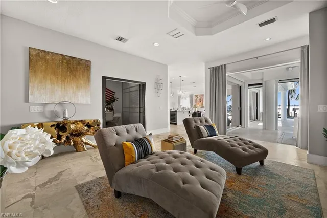 a large white kitchen with lots of counter space