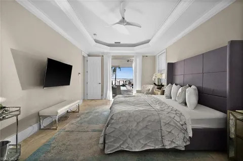 a bathroom with a bathtub and mirror