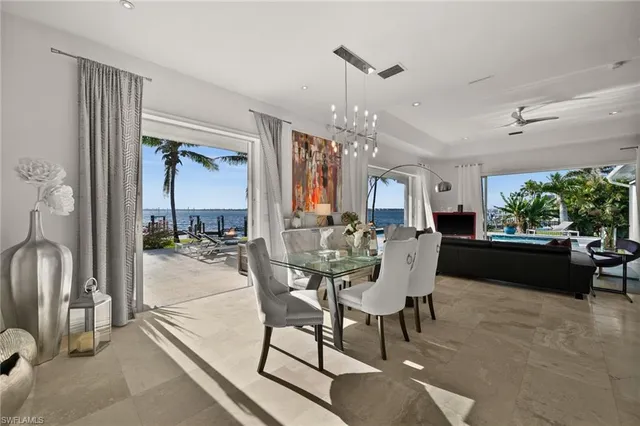 a bedroom with a bed and glass window