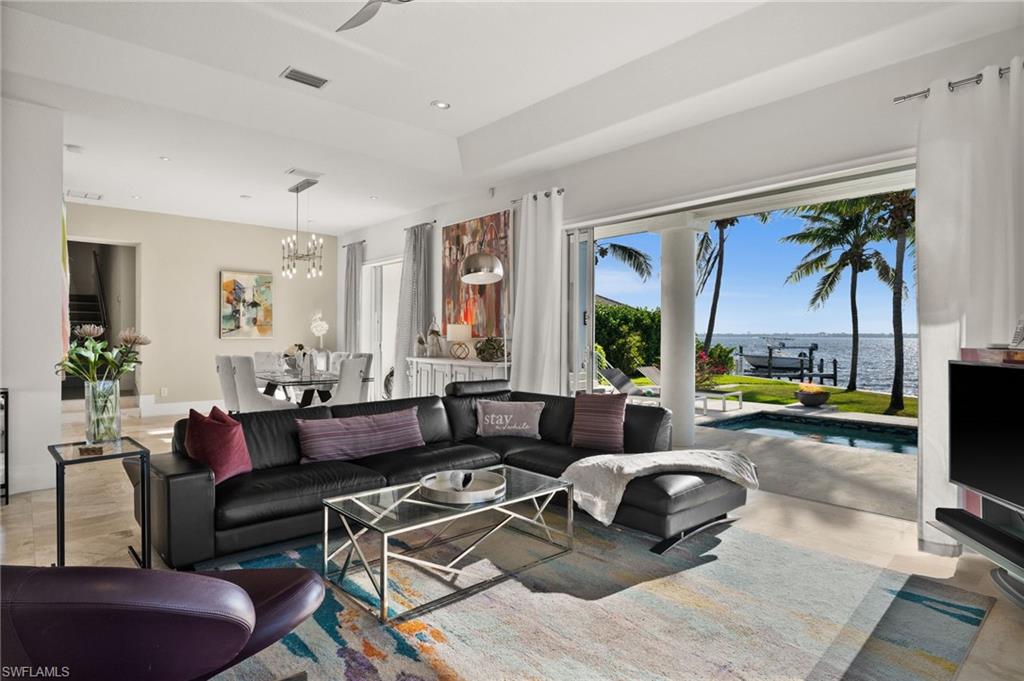 5625 Riverside Drive Cape Coral, FL 33904 - Photo 45 of 50 a living room with furniture and a large window