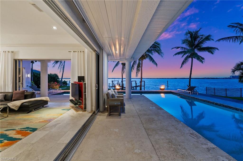 5625 Riverside Drive Cape Coral, FL 33904 - Photo 5 of 50 a view of a living room and kitchen