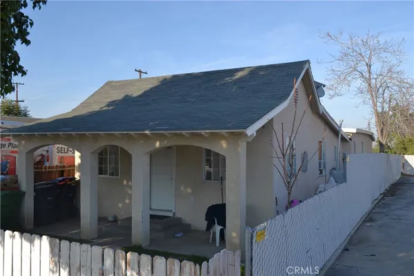 a front view of a house with parking