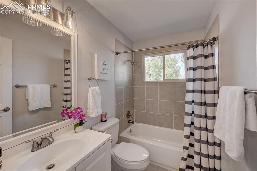 505 Inca Drive Colorado Springs, CO 80911 - Photo 12 of 33 a bathroom with a sink toilet tub and shower