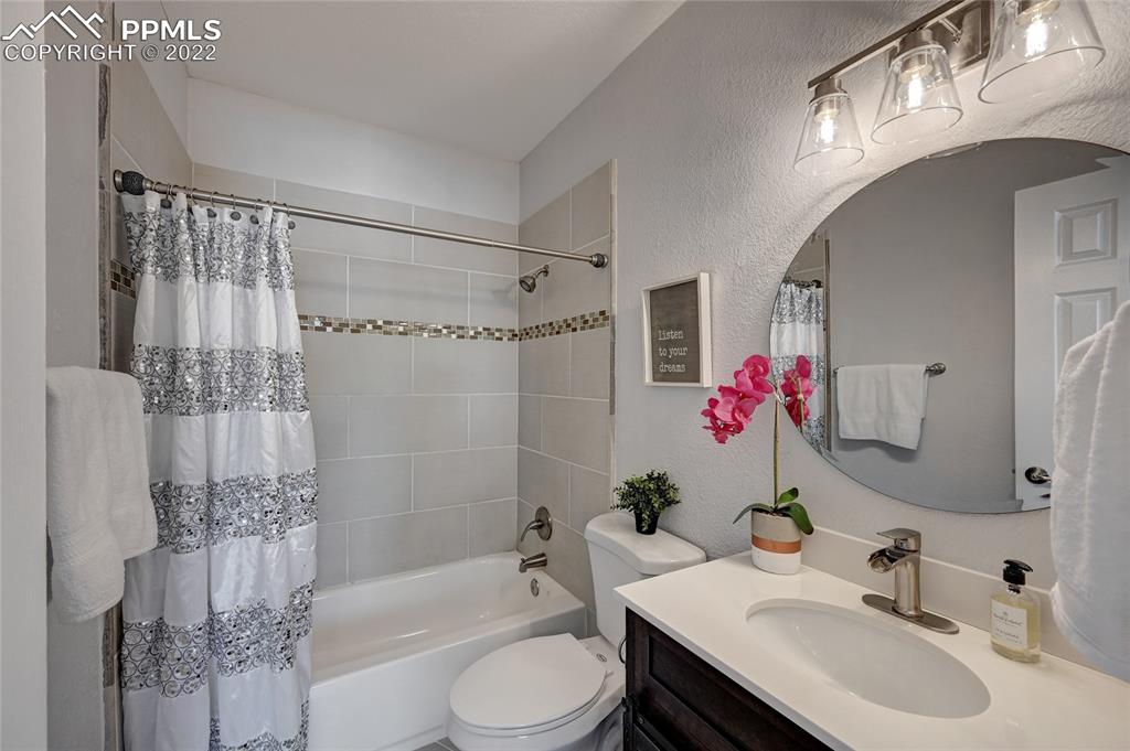 505 Inca Drive Colorado Springs, CO 80911 - Photo 13 of 33 a bathroom with a sink toilet tub and shower