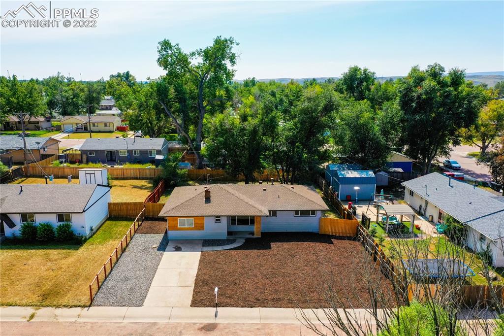 505 Inca Drive Colorado Springs, CO 80911 - Photo 16 of 33 an aerial view of a house with swimming pool and furniture