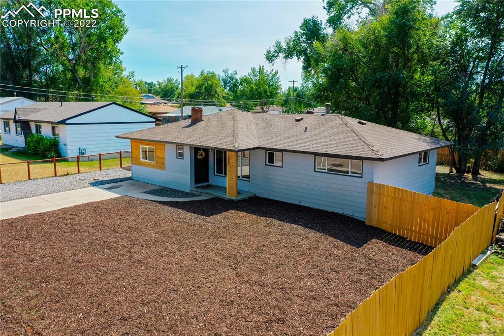 505 Inca Drive Colorado Springs, CO 80911 - Photo 18 of 33 front view of a house with a yard