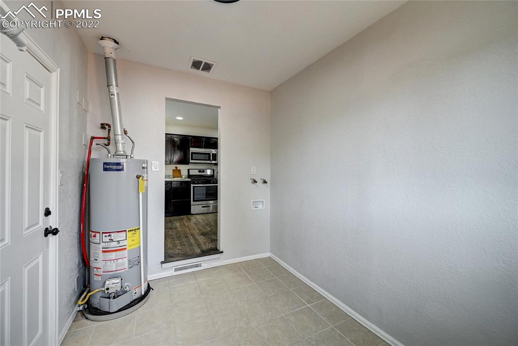 505 Inca Drive Colorado Springs, CO 80911 - Photo 22 of 33 an empty room with windows