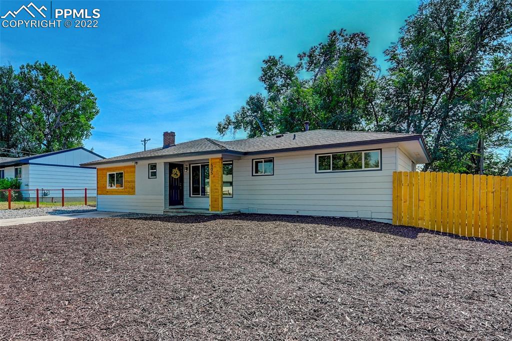 505 Inca Drive Colorado Springs, CO 80911 - Photo 30 of 33 a house with trees in the background