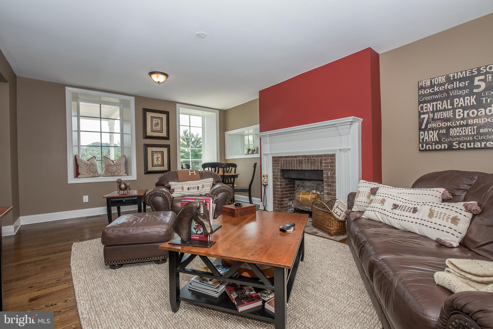 603 Beatty Road Media, PA 19063 - Photo 11 of 84 a living room with furniture a fireplace and window
