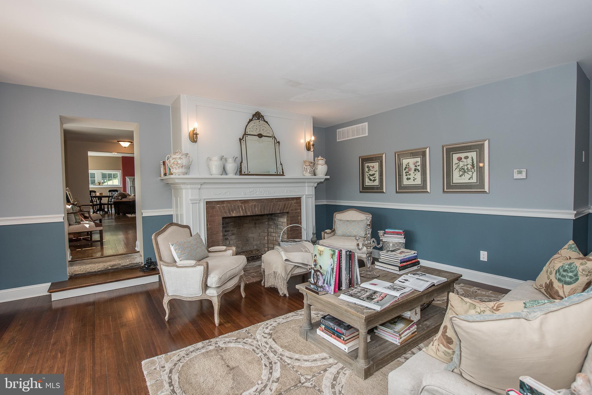 603 Beatty Road Media, PA 19063 - Photo 20 of 84 a living room with furniture and a fireplace